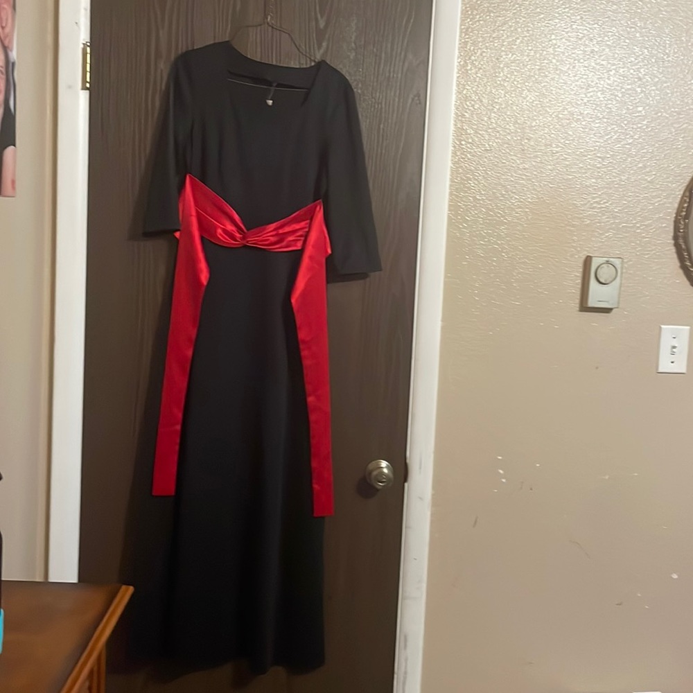 Full length black dress. Formally choir dress. Great for formal or dressy wear.